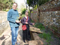 Planting flowers in the Franciscan Path